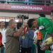Pj Bupati Langkat Kalungkan Medali kepada Juara Cabang Olahraga Sambo