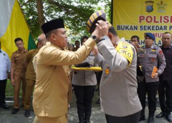 Pemberian Tanjak Melayu Awali Kolaborasi Pemkab Langkat Dengan Polda Sumut