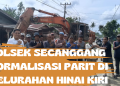 Polsek Secanggang Normalisasi Parit di Kelurahan Hinai Kiri