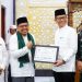 Sekda Amril Pimpin Tim II Safari Ramadhan di Stabat, Serahkan Hibah Rp20 Juta untuk Masjid