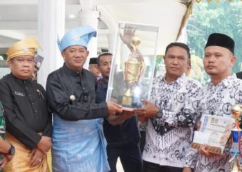 Dibawah Hujan Hardiknas, Syah Afandin Tegaskan Masa Depan Pendidikan Langkat