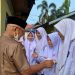 Bupati Yulianto Bagikan Ribuan Masker untuk Pelajar dan Pengguna Jalan